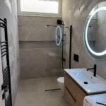 Turnkey Seaside Apartment: Fully Renovated Ground-Floor Property in Paleo Faliro · VelaProperty