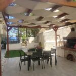 Prime Coastal Investment: Fully Renovated Sea-View Apartment with Private Garden in Paleo Faliro · VelaProperty