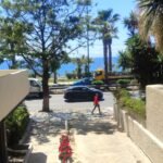 Prime Coastal Investment: Fully Renovated Sea-View Apartment with Private Garden in Paleo Faliro · VelaProperty