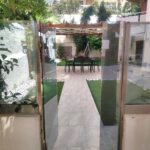 Prime Coastal Investment: Fully Renovated Sea-View Apartment with Private Garden in Paleo Faliro · VelaProperty