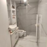 Prime Coastal Investment: Fully Renovated Sea-View Apartment with Private Garden in Paleo Faliro · VelaProperty